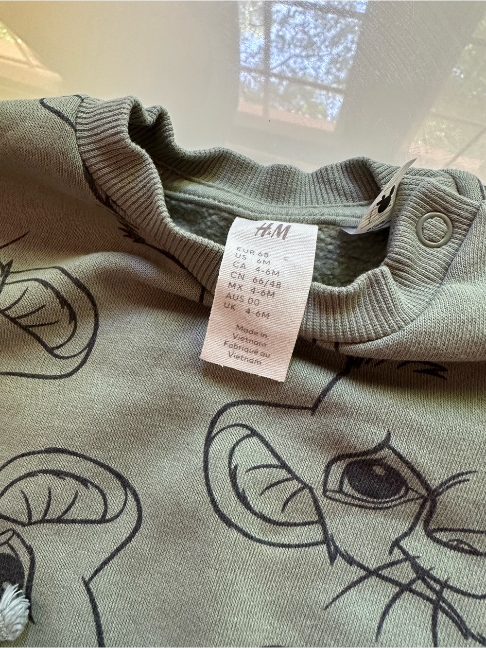 H&M Olive Green Baby Top with Black Lion Outline